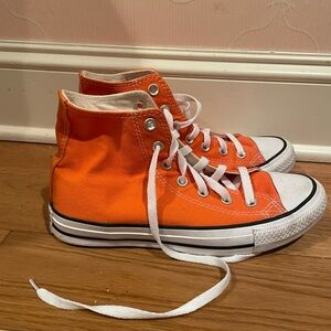 Orange hi top converse sneakers